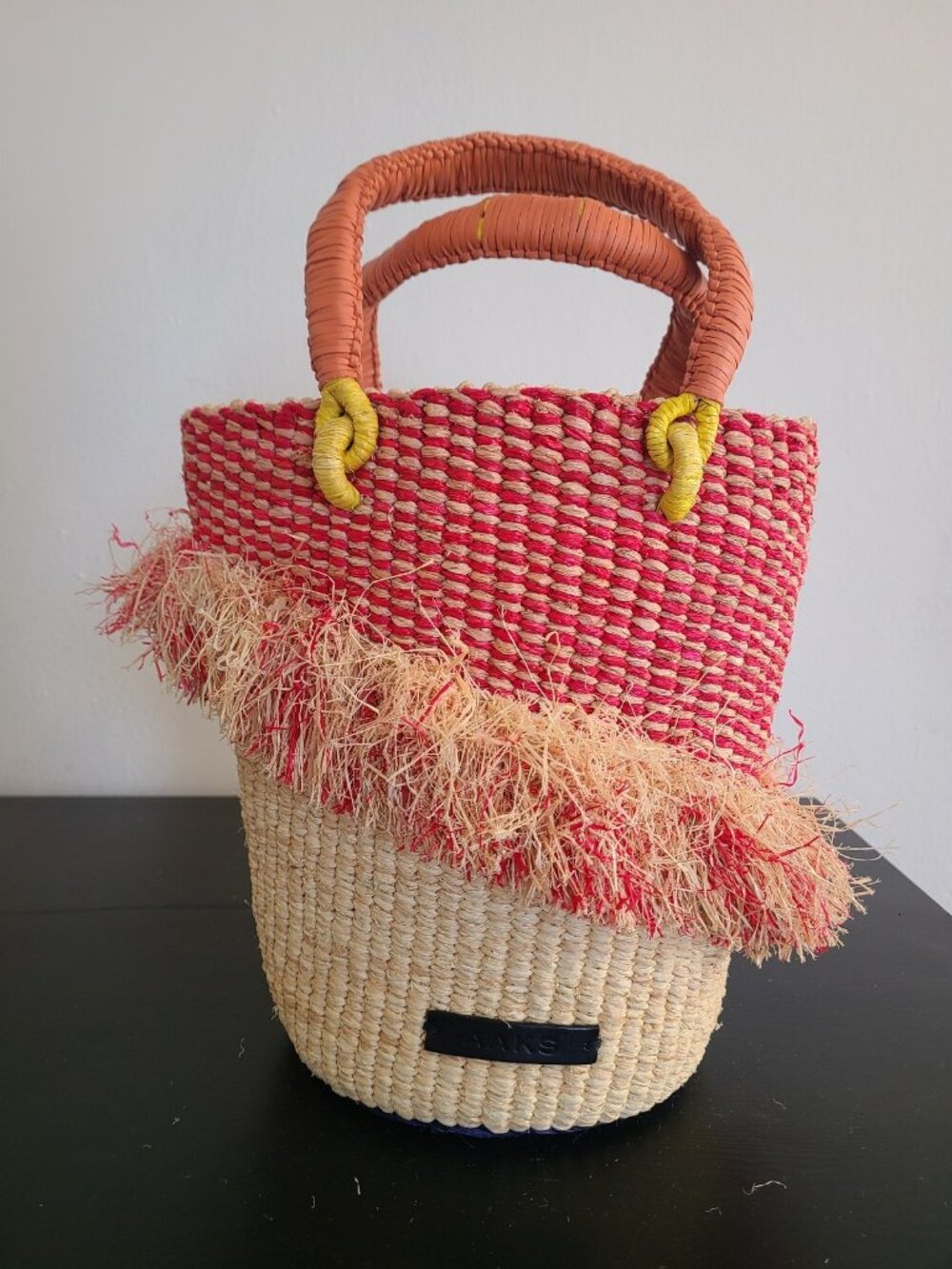 AAKS Tia Ruffle Raffia Bucket Bag